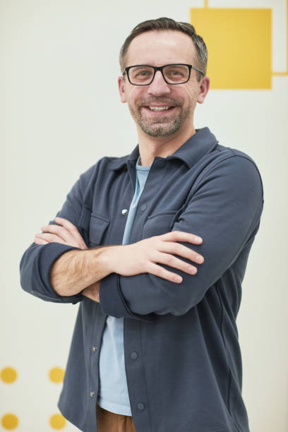 istock Smiling male teacher 1317584963