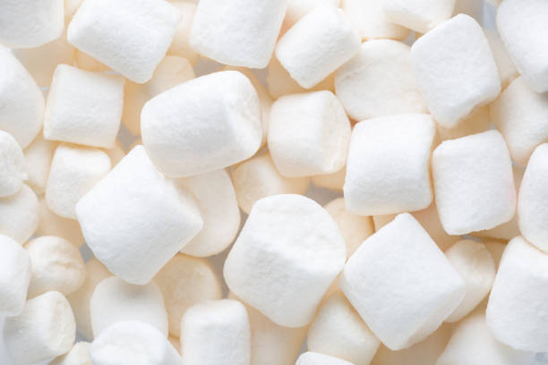 istock Mini marshmallows of white color. Selective Focus. Flat lay. 1317586362