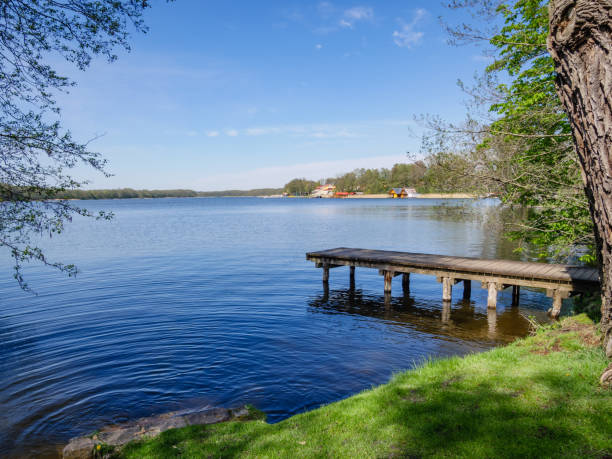 istock Boat jetty on the Mecklenburg Lake District in spring 1317586792
