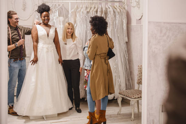istock Designer making adjustment to bridal gown 1317588118