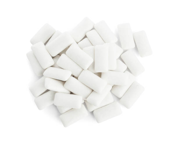 istock Heap of chewing gum pieces on white background, top view 1317589537
