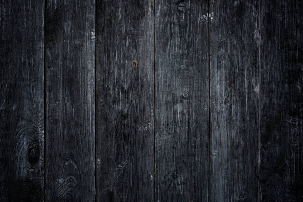 istock Aged dark natural wood texture 1317589635