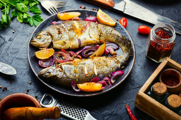 istock Two grilled trouts with lemon,fish dish 1317590781