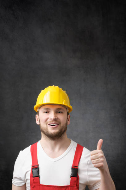 istock A happy worker showing thumbs up sign 1317592624
