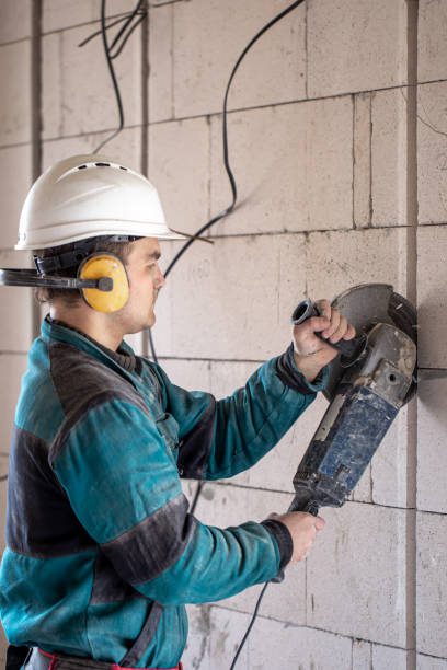 istock A handyman at a construction site works as a grinder. 1317596335