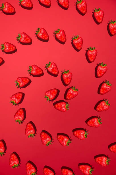Strawberries on a red background