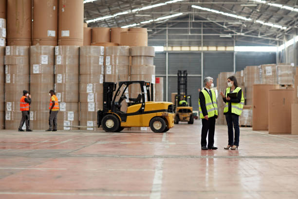 istock Distribution Center Managers and Workmen in Time of COVID-19 1317600246
