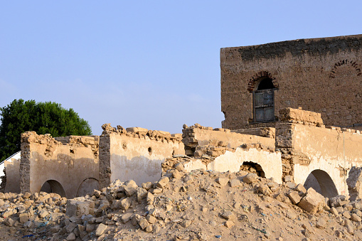 Berbera, Sahil Region, Somaliland, Somalia: ruins of a colonial building destroyed in the Somali civil war, piles of rubble - Suufi Hassan Road - Darole historic district
