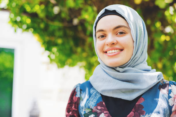 istock Middle Eastern Girl Smiling at the Camera 1317607395