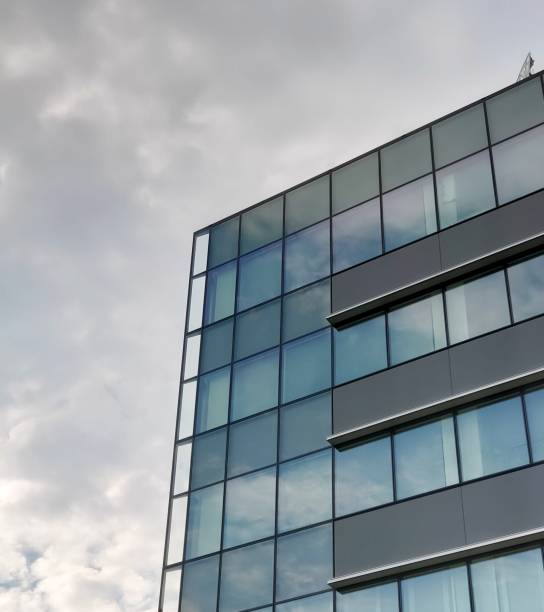 istock Urban office building and cloudy sky 1317611651