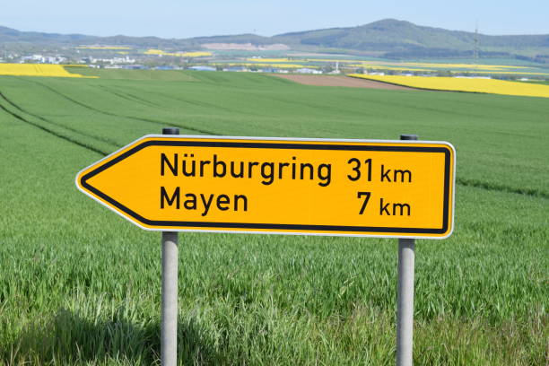traffic sign towards Nürburgring and Mayen Eifel nürburgring stock pictures, royalty-free photos & images