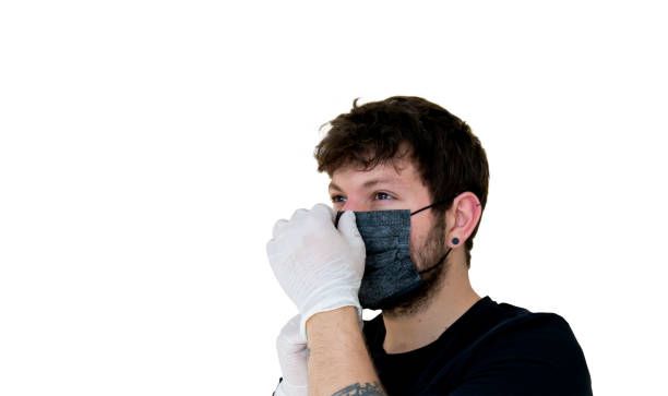 istock young male wearing covid-19 mask 1317613215