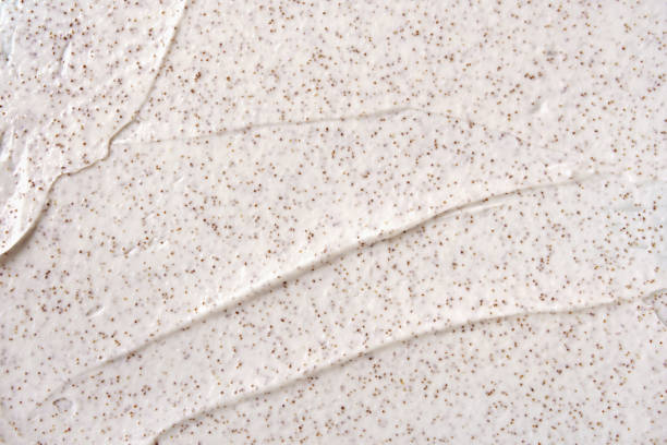 istock Texture of organic white scrub with Exfoliating coffee particles. Close-up 1317614501