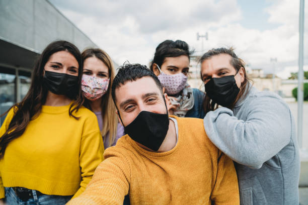 istock Five millennial friends are taking a selfie together 1317614616