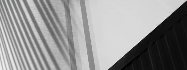 istock modern black and white architecture abstract with sky banner background 1317615140