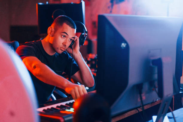 istock Sound engineer working and mixing music indoors in the studio 1317616043