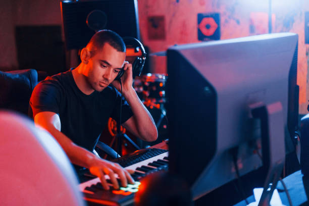 istock Sound engineer working and mixing music indoors in the studio 1317616050