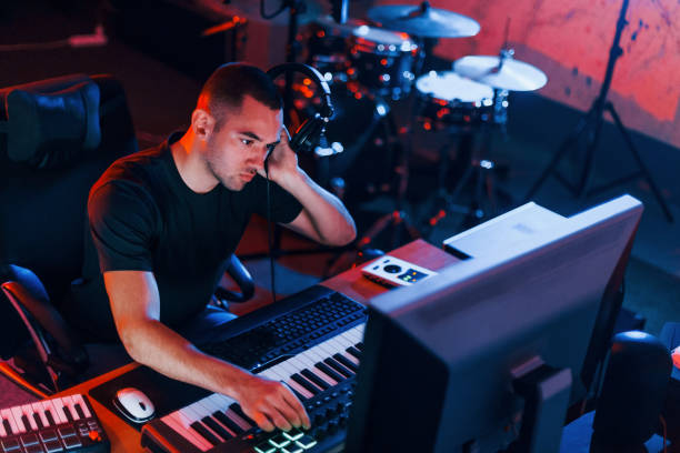 istock Sound engineer working and mixing music indoors in the studio 1317616148