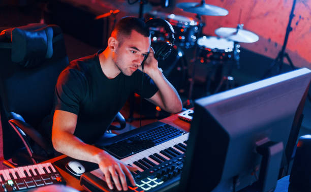 istock Sound engineer working and mixing music indoors in the studio 1317616170
