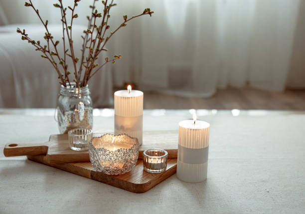 istock Home still life with burning candles as home decor details. 1317618947