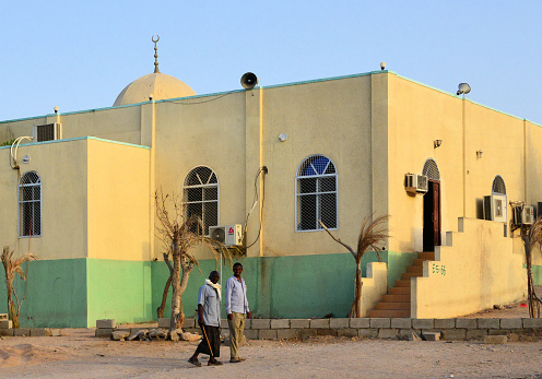 Berbera, Sahil Region, Somaliland, Somalia: faithful arrive at the Saeed Omar Ali Street mosque.