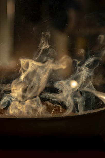 istock Fish fillet fries in the pan while steaming 1317622353