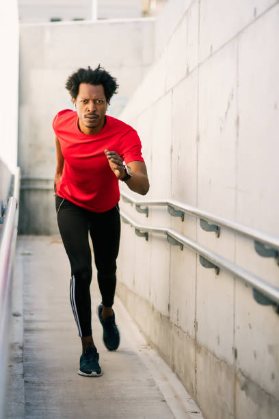 istock Athletic man running and doing exercise outdoors. 1317623723