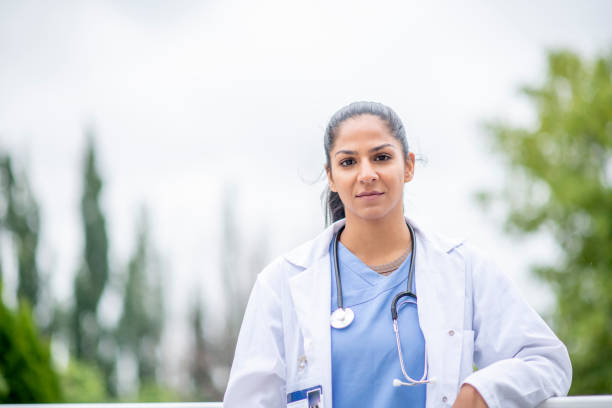 istock Female doctor outside 1317626857