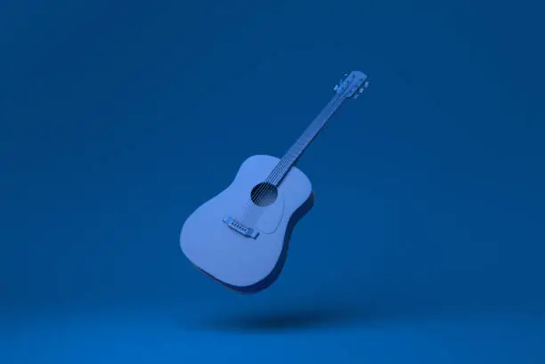 Photo of Blue Guitar acoustic body floating in blue background. minimal concept idea creative. monochrome. 3D render.