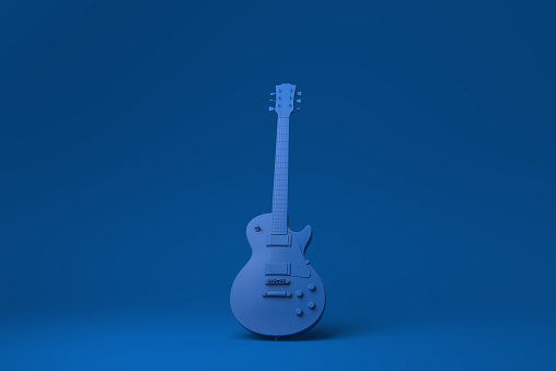 Blue Electric guitar in blue background. minimal concept idea creative. monochrome. 3D render.