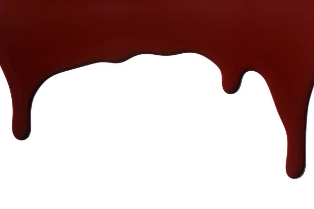 istock Melted chocolate dripping isolated on white background 1317628833