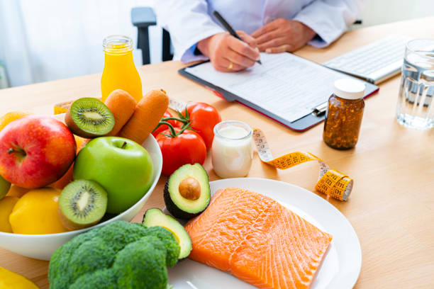 istock Nutritionist at work planning well balanced diet 1317632720