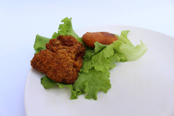 istock Karaage fried chicken, nugget, and lettuce 1317633182