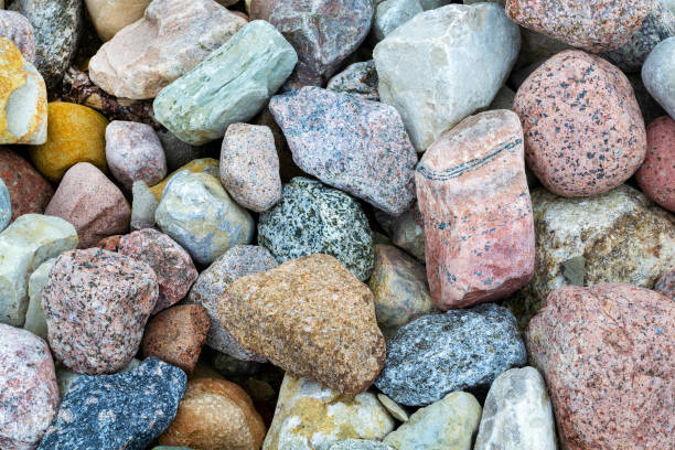 istock Multicolored colorful small pebbles on a beach. Nature background, texture. 1317634379