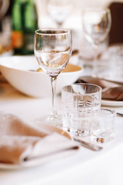 istock Flower table decorations for holidays and wedding dinner. Table set for holiday, event, party or wedding reception in a restaurant. 1317635540
