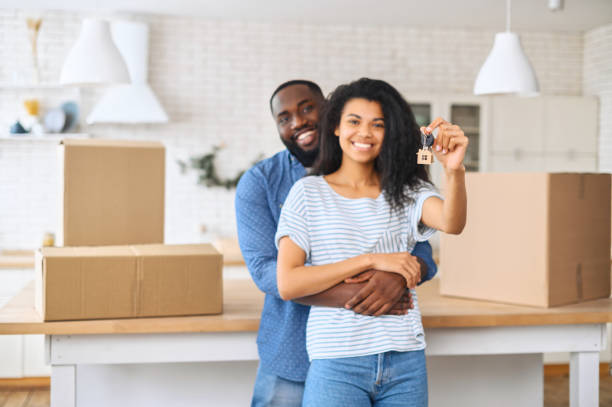 istock African-American couple with keys 1317640945
