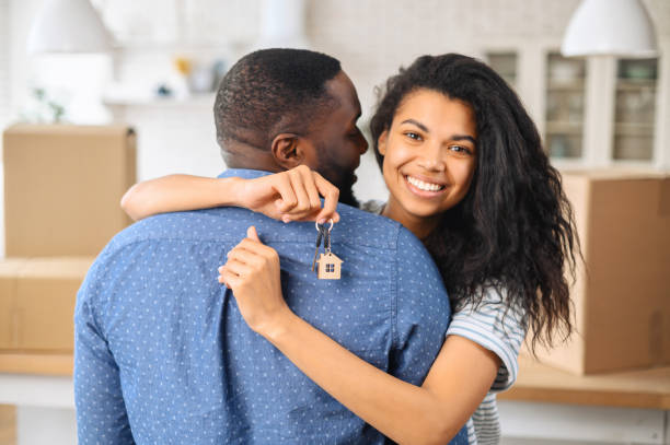 istock African-American couple with keys 1317640998