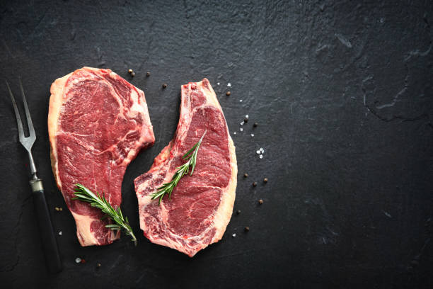 istock Two raw dry aged beef rib steaks (cote de boeuf) 1317641845