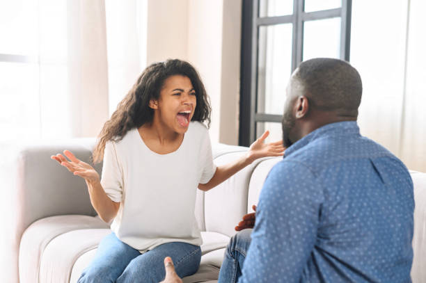 istock African-American couple arguing at home 1317641889