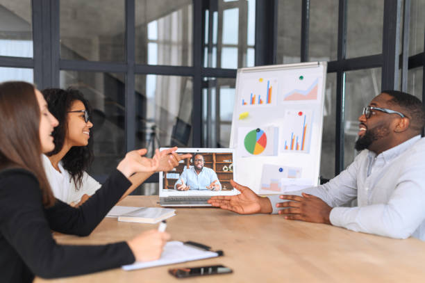 istock Multiracial team on a meeting with boss via video link 1317641999