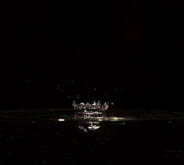 istock Highspeedphotography with water drops without flash in jena 1317643772