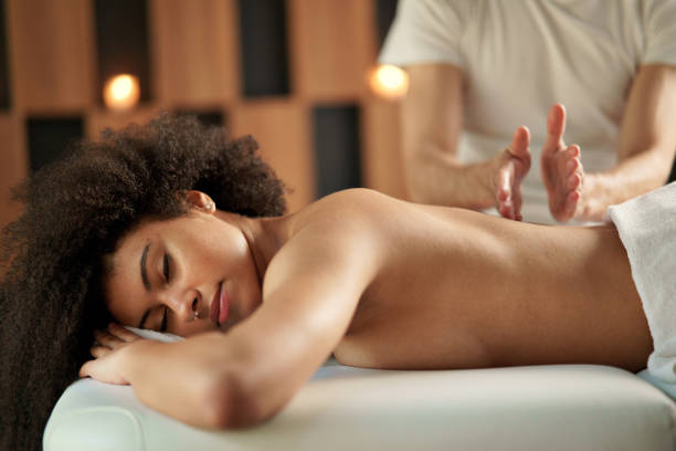 istock Young woman having back massage at the spa. 1317648946