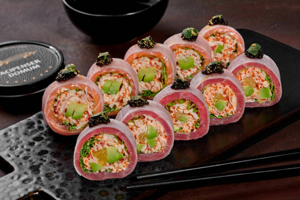 istock Rolls with salmon and tuna in mamenori with caviar 1317651035