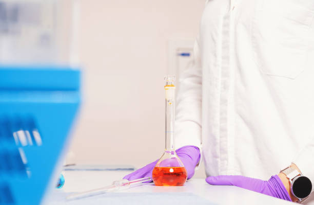 istock Medical research laboratory: test samples flasks on a table close-up 1317651776