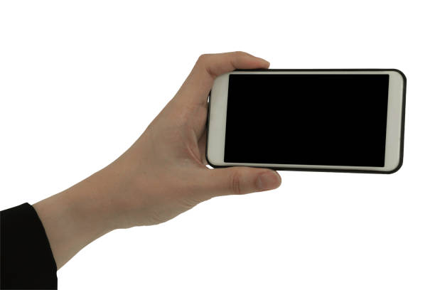 istock One hand holding smartphone isolated on white background, mobile phone on hand with copy space for your text including clipping path. 1317654022