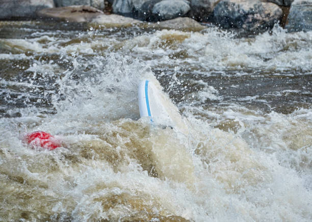 istock surfing wave in Poudre River Whitewater Park 1317655026