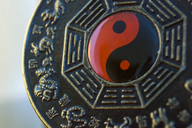 Extreme closeup macro photography of a Chinese Bagua object showing ying yang theory Extreme closeup macro photography of a Chinese Bagua object showing ying yang theory. Art and culture of China concept. tao symbol stock pictures, royalty-free photos & images