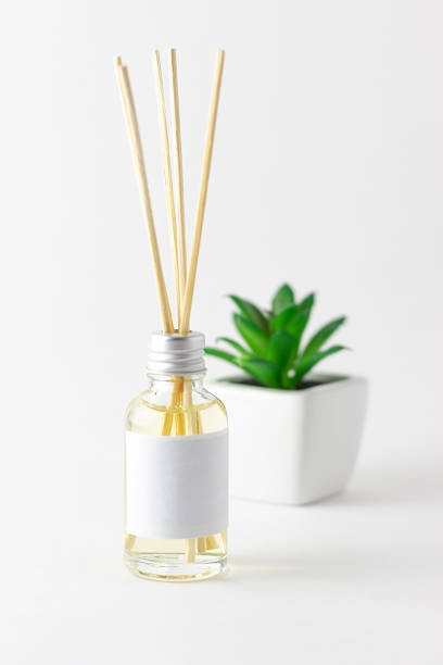 istock Incense sticks for home with a floral scent. Natural aroma for home, aroma diffuser. Eco-friendly home fragrance concept. copy space 1317658604