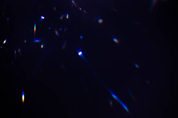 istock colorful warm rainbow crystal light leaks on black background 1317661990