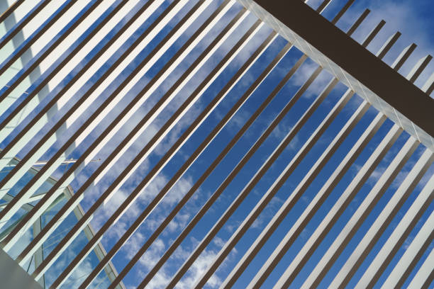 Metal roof of veranda. Metal roof of veranda. view into the blue clear sky. Touristic resort theme. Concept of he resting and relaxation in the modern luxury hotel. patio cover stock pictures, royalty-free photos & images